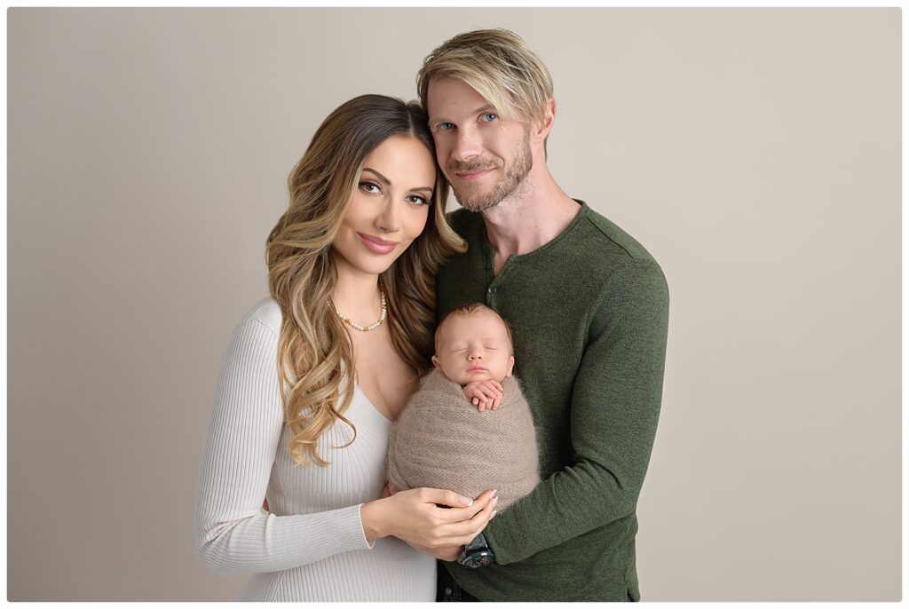 Newborn photography session with family and siblings in West Palm Beach, FL.